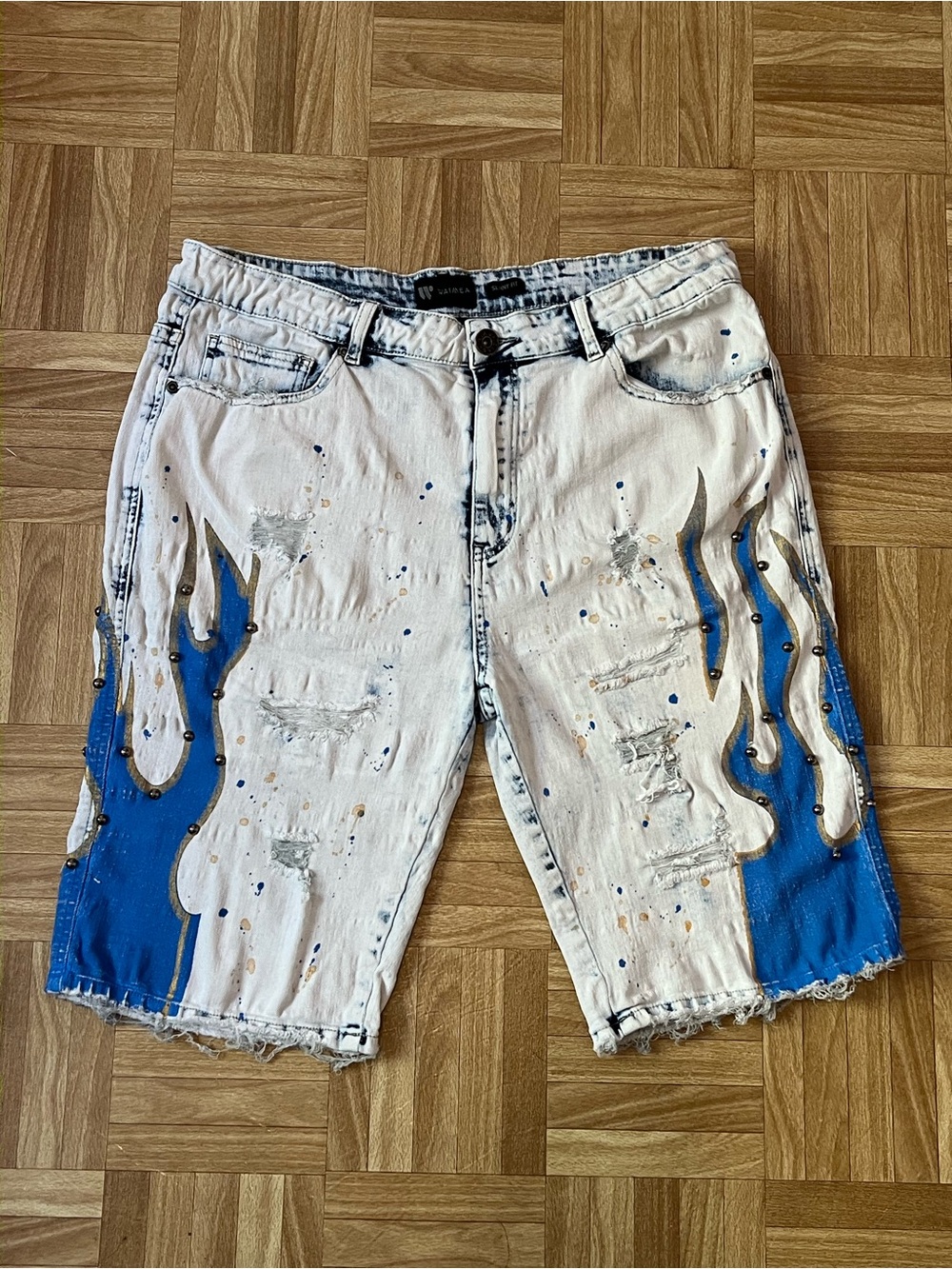 Men's White Distressed Denim Shorts with Blue Flame Detail
